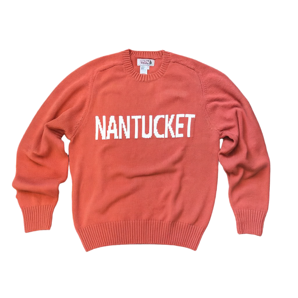 Red sweater with 'NANTUCKET' text on a black background